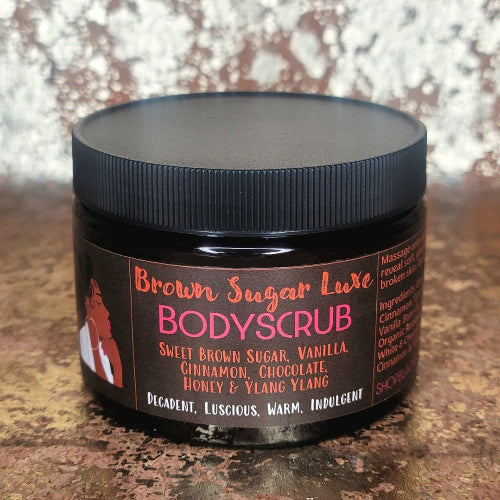 Brown Sugar Luxe Bodyscrub on a textured surface