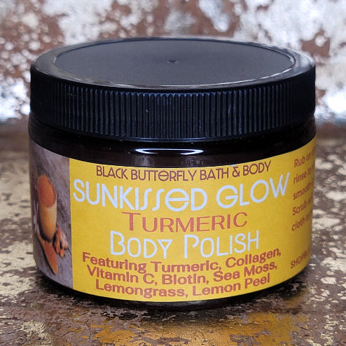 Jar of Sunkissed Glow Turmeric Body Polish on a textured surface